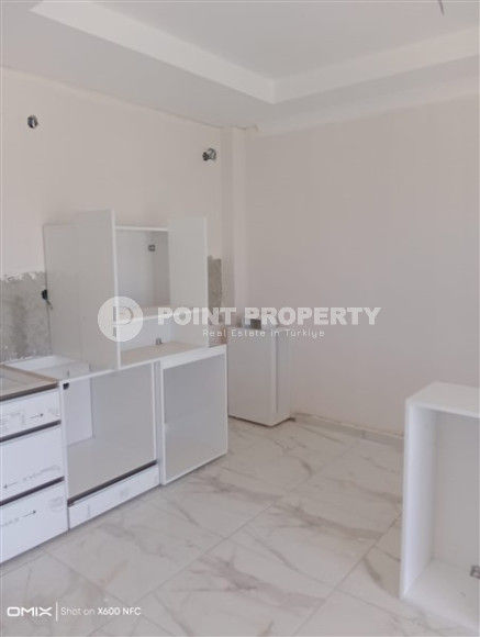 Двухкомнатная квартира, 50м², в доме городского типа на стадии строительства в районе Газипаша, Алания-id-1870-фото-7