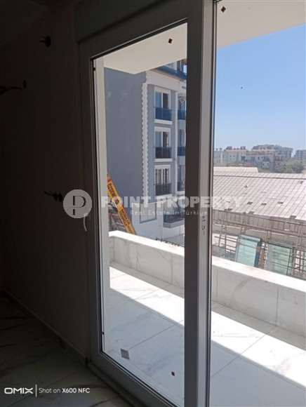 Двухкомнатная квартира, 50м², в доме городского типа на стадии строительства в районе Газипаша, Алания-id-1870-фото-8