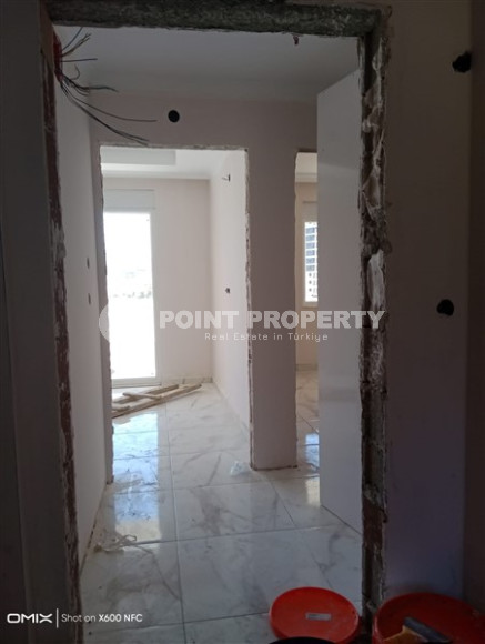 Двухкомнатная квартира, 50м², в доме городского типа на стадии строительства в районе Газипаша, Алания-id-1870-фото-13