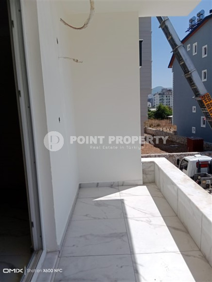 Двухкомнатная квартира, 50м², в доме городского типа на стадии строительства в районе Газипаша, Алания-id-1870-фото-14