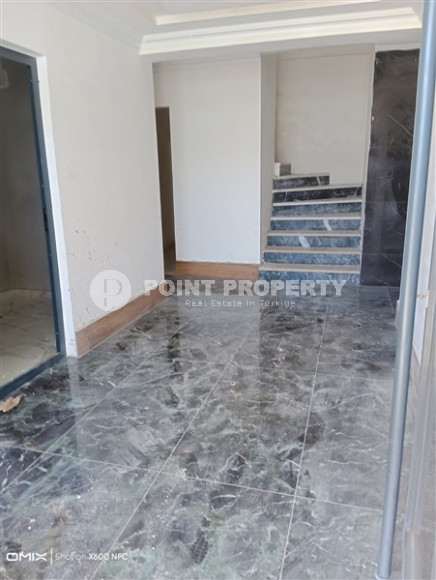 Двухкомнатная квартира, 50м², в доме городского типа на стадии строительства в районе Газипаша, Алания-id-1870-фото-16