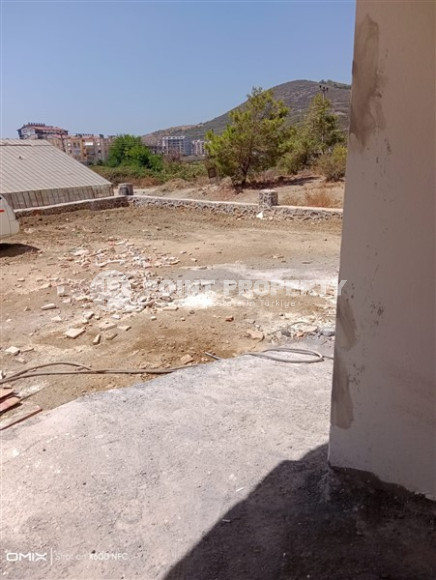 Двухкомнатная квартира, 50м², в доме городского типа на стадии строительства в районе Газипаша, Алания-id-1870-фото-18