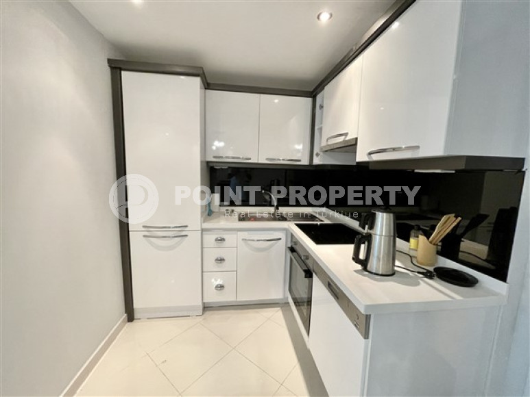 One-bedroom apartment, 65m², with elegant interior 150 meters from the sea in Oba, Alanya-id-1879-photo-7