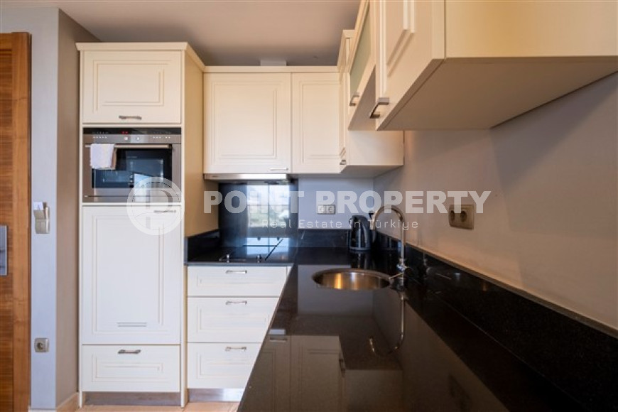 Меблированная трехкомнатная квартира с потрясающими видами в элитном комплексе Каргыджака, Алания-id-1880-фото-11