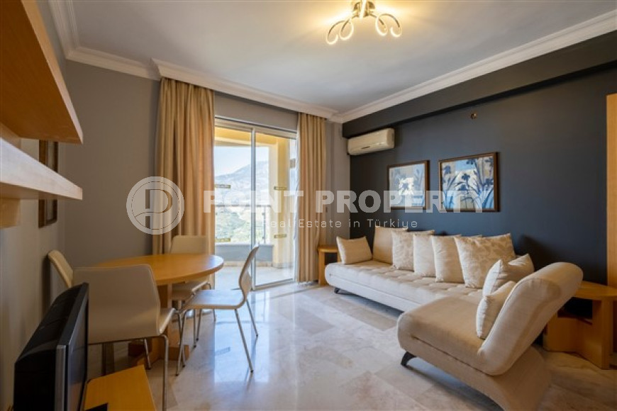 Меблированная трехкомнатная квартира с потрясающими видами в элитном комплексе Каргыджака, Алания-id-1880-фото-12