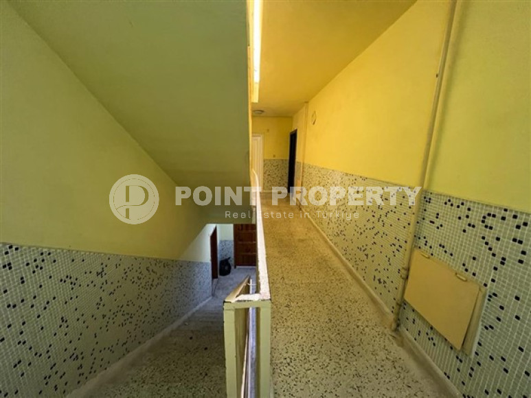 Двухкомнатная квартира, 60м², с отдельной кухней в доме городского типа в центре Алании-id-1881-фото-13