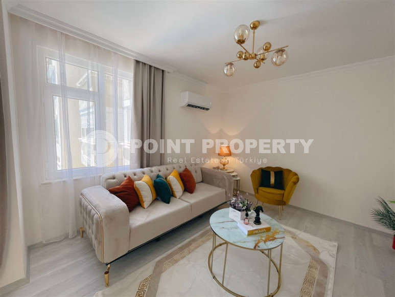 Заезжай и живи. Двухкомнатная квартира 1+1 в самом центре курортного города в 750 метрах от моря. Апартаменты находятся в районе Сарай Алании, который подходит для оформления ВНЖ.-id-1128-фото-3