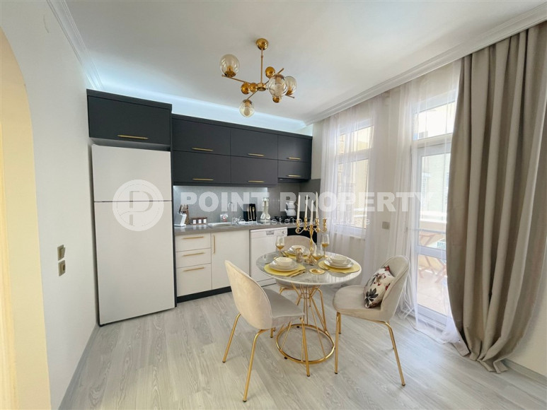 Заезжай и живи. Двухкомнатная квартира 1+1 в самом центре курортного города в 750 метрах от моря. Апартаменты находятся в районе Сарай Алании, который подходит для оформления ВНЖ.-id-1128-фото-4