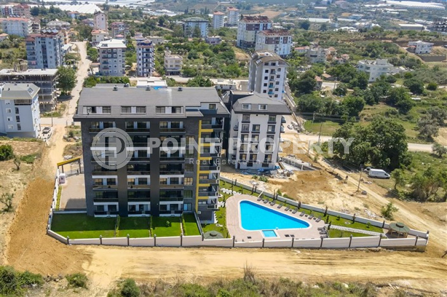 Don't miss the chance: large apartment 1+1, 64m², with access to the garden, in a new complex in Avsallar, Alanya-id-1890-photo-1