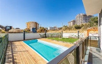 Don't miss the chance: large apartment 1+1, 64m², with access to the garden, in a new complex in Avsallar, Alanya-id-1890-photo-2