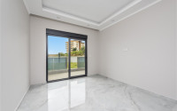 Don't miss the chance: large apartment 1+1, 64m², with access to the garden, in a new complex in Avsallar, Alanya-id-1890-photo-8