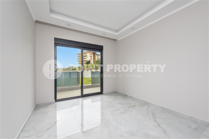 Don't miss the chance: large apartment 1+1, 64m², with access to the garden, in a new complex in Avsallar, Alanya-id-1890-photo-8