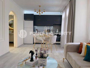 Заезжай и живи. Двухкомнатная квартира 1+1 в самом центре курортного города в 750 метрах от моря. Апартаменты находятся в районе Сарай Алании, который подходит для оформления ВНЖ.-id-1128-фото-5