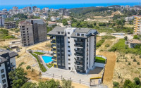 Don't miss the chance: large apartment 1+1, 64m², with access to the garden, in a new complex in Avsallar, Alanya-id-1890-photo-12