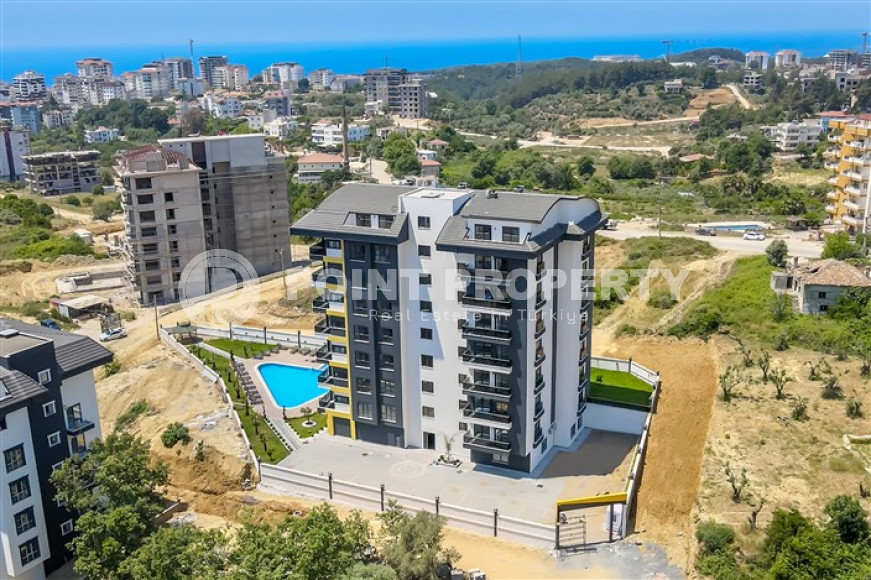 Don't miss the chance: large apartment 1+1, 64m², with access to the garden, in a new complex in Avsallar, Alanya-id-1890-photo-12