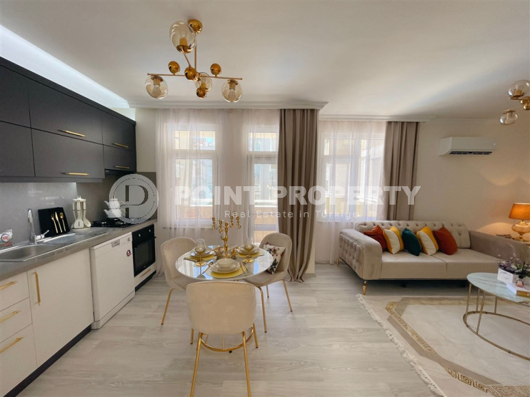 Заезжай и живи. Двухкомнатная квартира 1+1 в самом центре курортного города в 750 метрах от моря. Апартаменты находятся в районе Сарай Алании, который подходит для оформления ВНЖ.-id-1128-фото-6