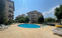 Resale property in the Oba area: three-room apartment, 110 m², in a residence with a swimming pool.-id-1893-photo-1