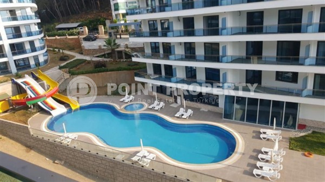 Меблированная квартира 1+1, 65м², в элитном комплексе с собственным пляжем в Каргыджаке, Алания-id-1895-фото-18