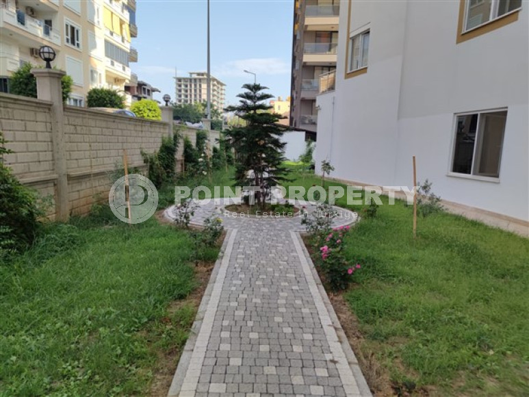 Апартаменты с одной спальней, 60м² в комплексе с инфраструктурой в Махмутларе, Алания, в 300м от моря-id-1900-фото-25