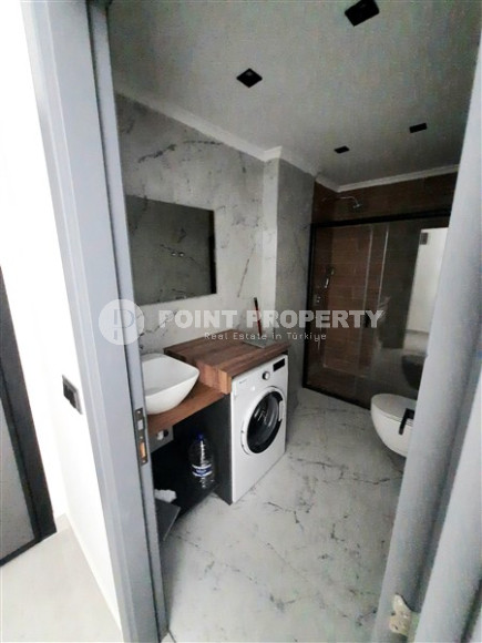 One bedroom apartment, 55m², in a new complex with infrastructure in Mahmutlar, Alanya-id-1906-photo-10