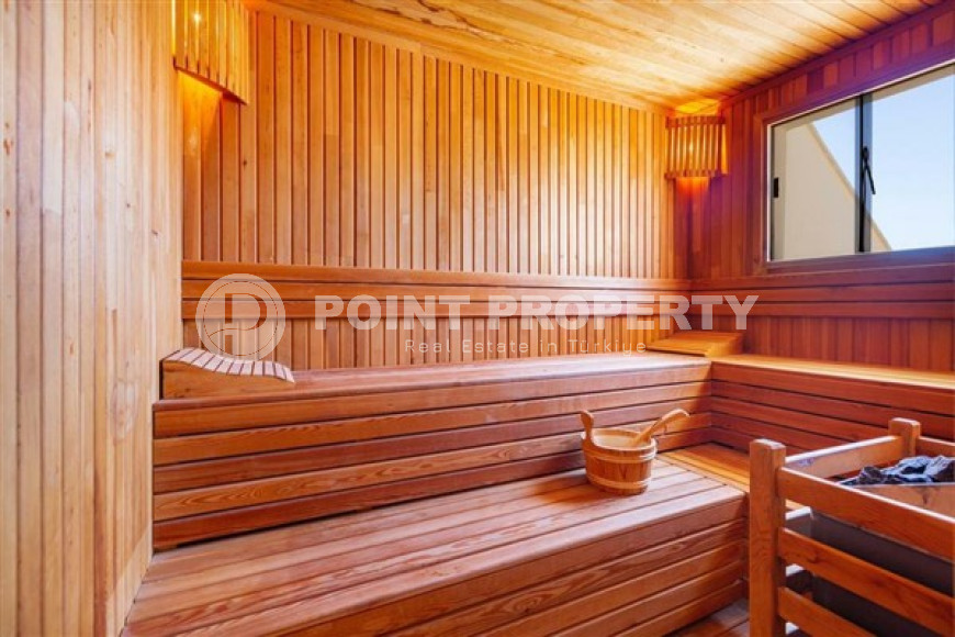 Spacious two-bedroom apartment, 125m², with mountain views in the center of Mahmutlar 250m from the sea-id-1932-photo-11