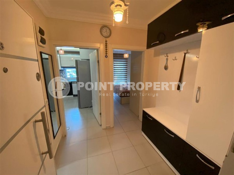 Уютная двухкомнатная квартира, 65м², в резиденции с бассейном в районе Махмутлар, Алания-id-1933-фото-2