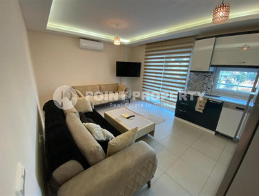 Уютная двухкомнатная квартира, 65м², в резиденции с бассейном в районе Махмутлар, Алания-id-1933-фото-4