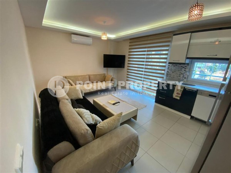 Уютная двухкомнатная квартира, 65м², в резиденции с бассейном в районе Махмутлар, Алания-id-1933-фото-4