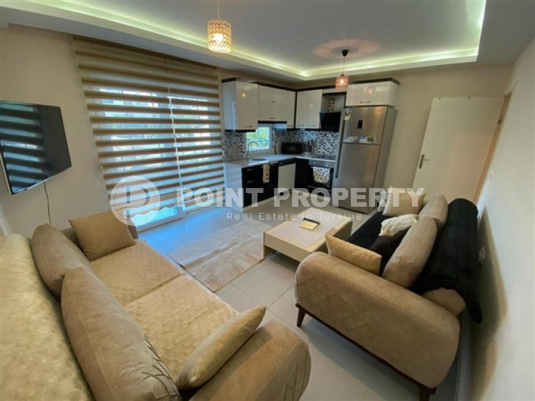 Уютная двухкомнатная квартира, 65м², в резиденции с бассейном в районе Махмутлар, Алания-id-1933-фото-5