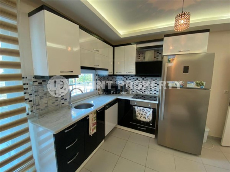 Уютная двухкомнатная квартира, 65м², в резиденции с бассейном в районе Махмутлар, Алания-id-1933-фото-6