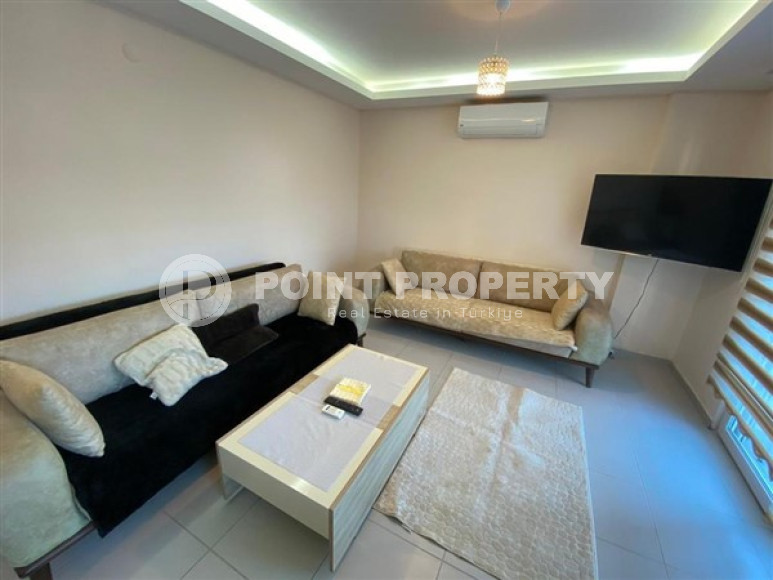 Уютная двухкомнатная квартира, 65м², в резиденции с бассейном в районе Махмутлар, Алания-id-1933-фото-10