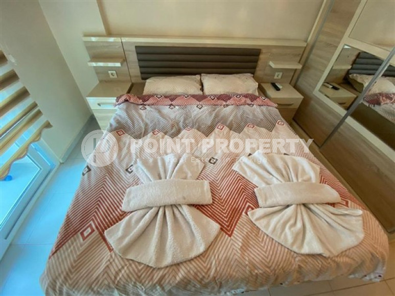 Уютная двухкомнатная квартира, 65м², в резиденции с бассейном в районе Махмутлар, Алания-id-1933-фото-13