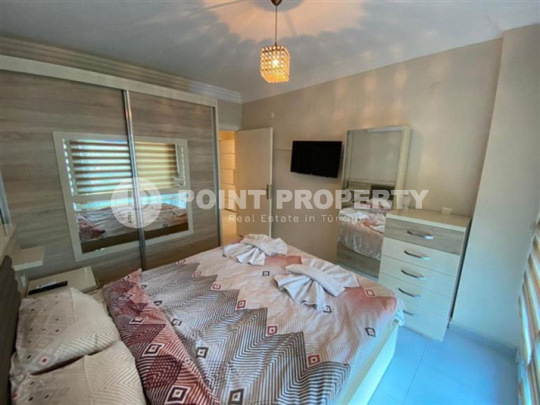 Уютная двухкомнатная квартира, 65м², в резиденции с бассейном в районе Махмутлар, Алания-id-1933-фото-14