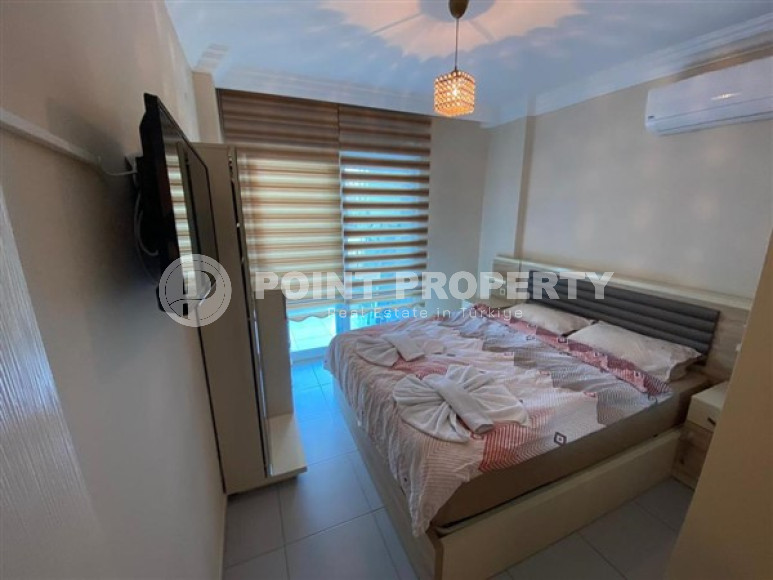 Уютная двухкомнатная квартира, 65м², в резиденции с бассейном в районе Махмутлар, Алания-id-1933-фото-15