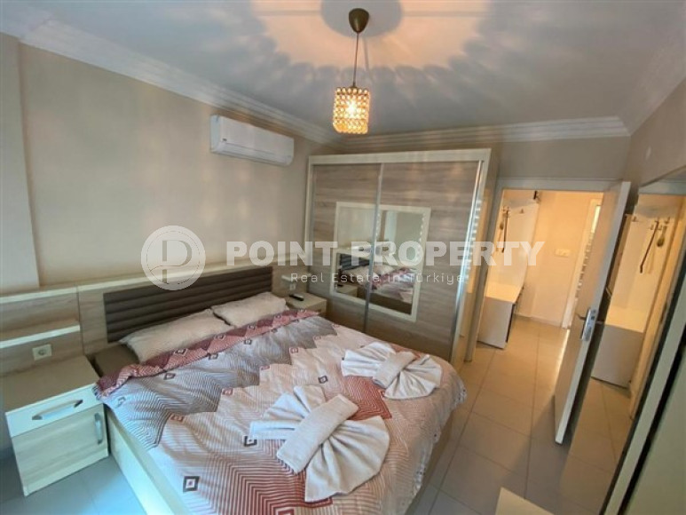 Уютная двухкомнатная квартира, 65м², в резиденции с бассейном в районе Махмутлар, Алания-id-1933-фото-16