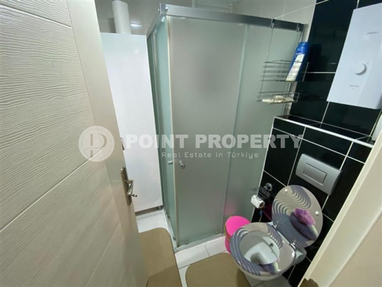 Уютная двухкомнатная квартира, 65м², в резиденции с бассейном в районе Махмутлар, Алания-id-1933-фото-18