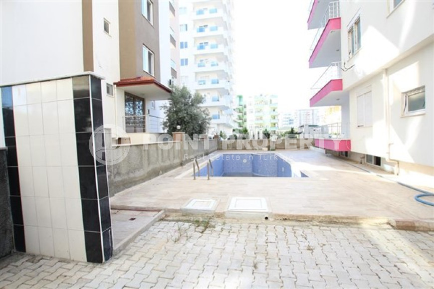 Уютная двухкомнатная квартира, 65м², в резиденции с бассейном в районе Махмутлар, Алания-id-1933-фото-24