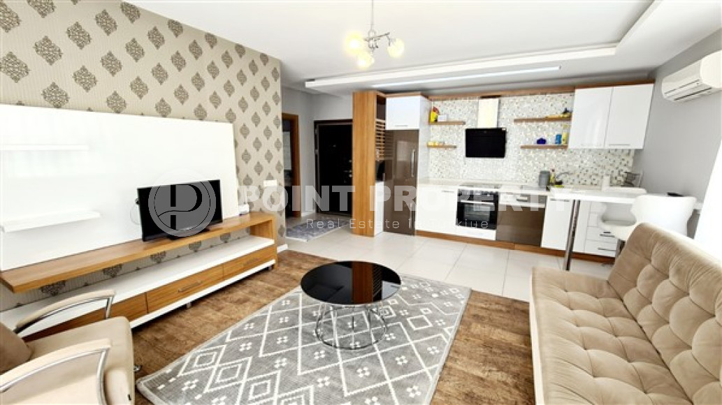Ready to move in, one bedroom apartment, 70m², on the main street of Mahmutlar 450m from the sea-id-1941-photo-2