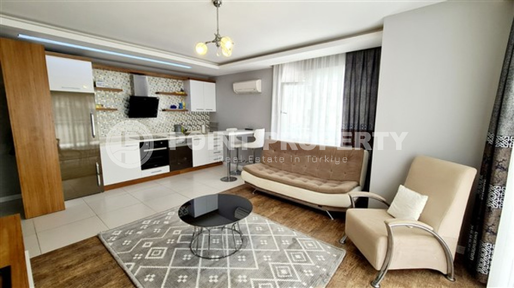 Ready to move in, one bedroom apartment, 70m², on the main street of Mahmutlar 450m from the sea-id-1941-photo-5