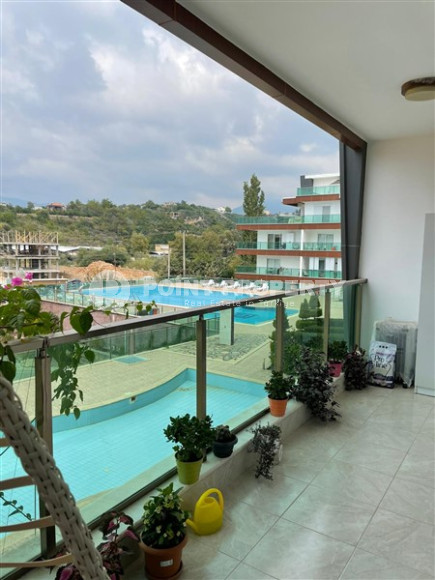 Уютный садовый дуплекс с двумя спальнями, 115м², в резиденции с бассейном в районе Кестель, Алания-id-1949-фото-17