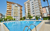 Three-room apartment, 110m², in a cozy complex with a swimming pool in the center of Alanya-id-1960-photo-1