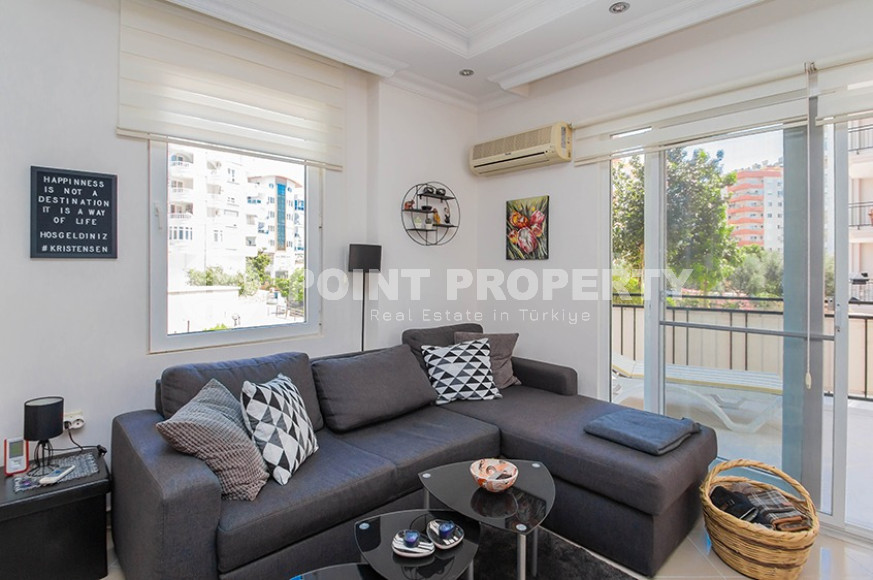 Furnished three-room apartment, 100m², in a cozy complex with infrastructure in Alanya Tosmur area-id-1961-photo-1
