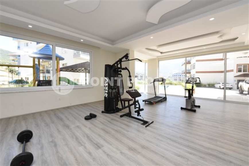 Linear four-room apartment, 150m², with separate kitchen, 1500m from the sea in Oba, Alanya-id-1984-photo-21