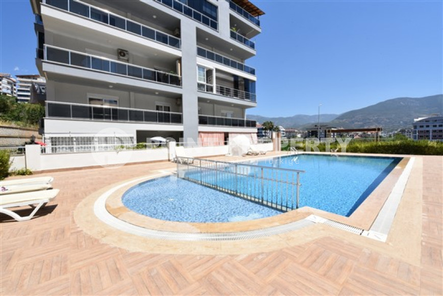 Linear four-room apartment, 150m², with separate kitchen, 1500m from the sea in Oba, Alanya-id-1984-photo-26