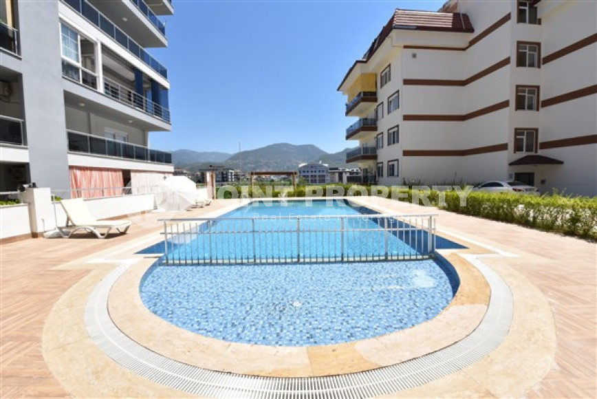 Linear four-room apartment, 150m², with separate kitchen, 1500m from the sea in Oba, Alanya-id-1984-photo-29
