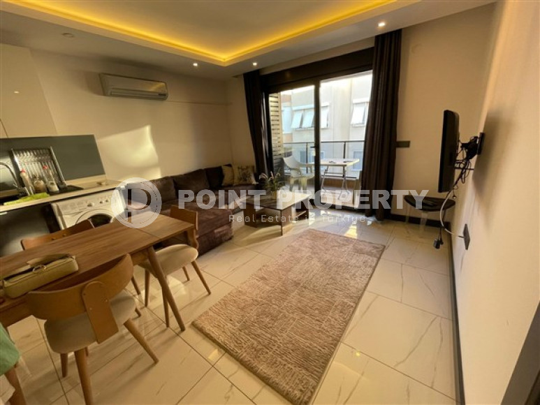 Квартира с одной спальней, 55м², в новом комплексе с инфраструктурой в центре Алании-id-1990-фото-1