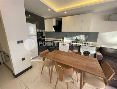 One bedroom apartment, 55m², in a new complex with infrastructure in the center of Alanya-id-1990-photo-4