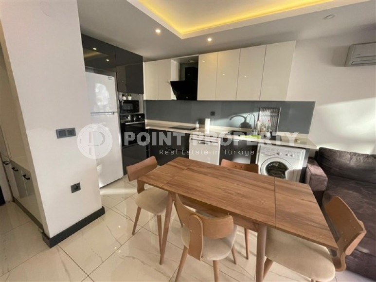 Квартира с одной спальней, 55м², в новом комплексе с инфраструктурой в центре Алании-id-1990-фото-4