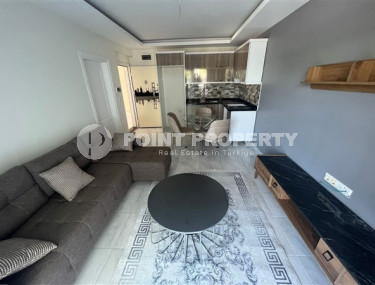 Ready to move in, one bedroom apartment, 58m², 900m from the sea in Mahmutlar, Alanya-id-2002-photo-1