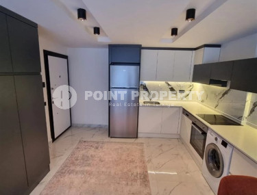 New, ready to move in, one bedroom apartment, 60m², in the center of Alanya-id-2009-photo-3